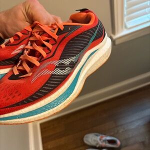 Saucony Red and Black Athletic Shoes